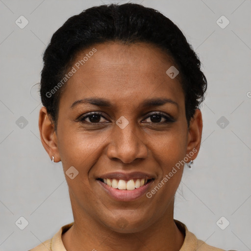 Joyful latino young-adult female with short  black hair and brown eyes