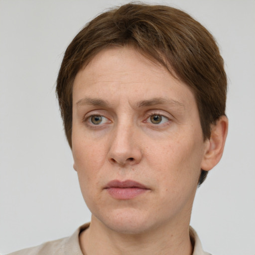 Neutral white adult female with short  brown hair and grey eyes