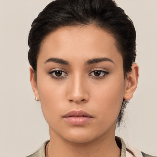 Neutral white young-adult female with short  brown hair and brown eyes