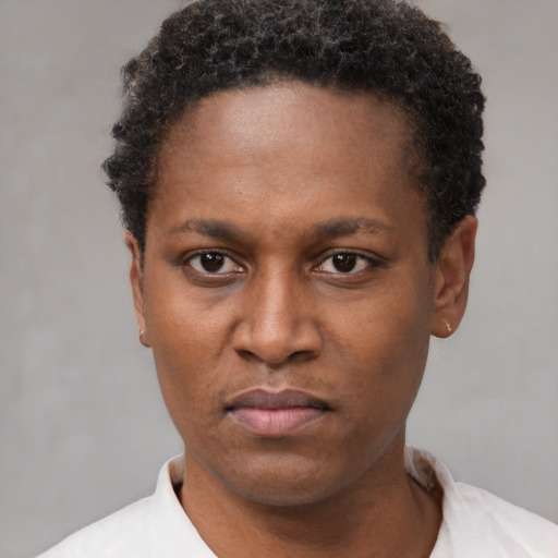 Neutral black young-adult female with short  black hair and brown eyes