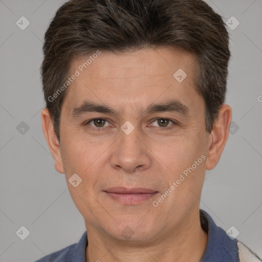 Joyful white adult male with short  brown hair and brown eyes