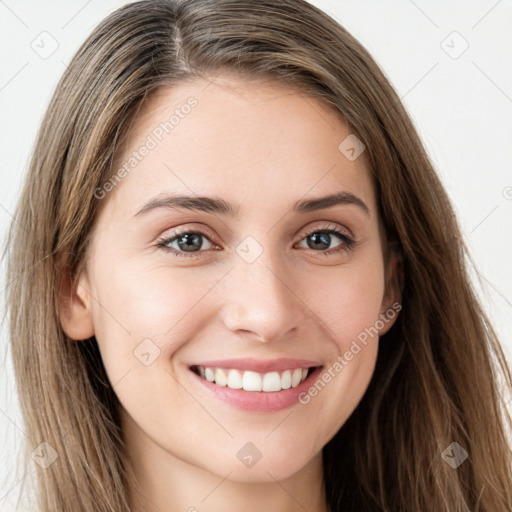 Joyful white young-adult female with long  brown hair and green eyes