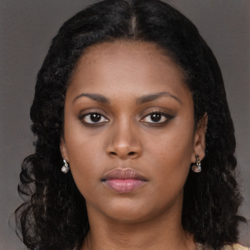Neutral black young-adult female with long  black hair and brown eyes