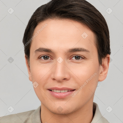 Joyful white young-adult male with short  brown hair and brown eyes