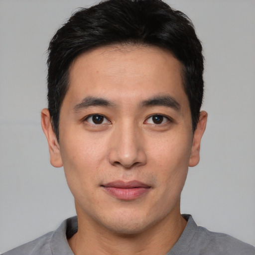 Neutral asian young-adult male with short  black hair and brown eyes