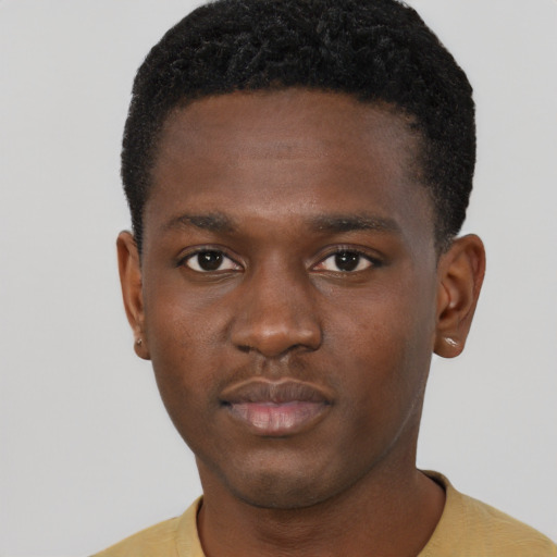 Neutral black young-adult male with short  brown hair and brown eyes