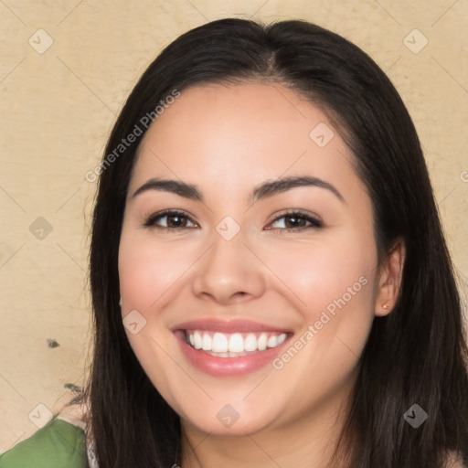 Joyful white young-adult female with long  black hair and brown eyes