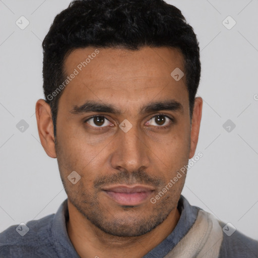 Neutral latino young-adult male with short  black hair and brown eyes