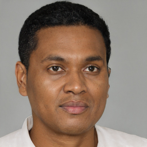 Neutral black young-adult male with short  brown hair and brown eyes