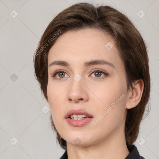 Neutral white young-adult female with medium  brown hair and brown eyes