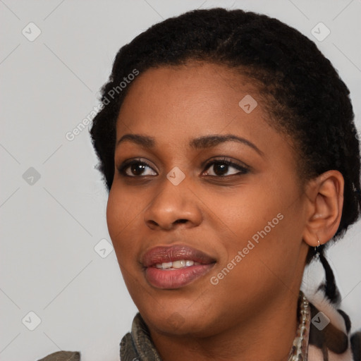 Joyful black young-adult female with short  black hair and brown eyes