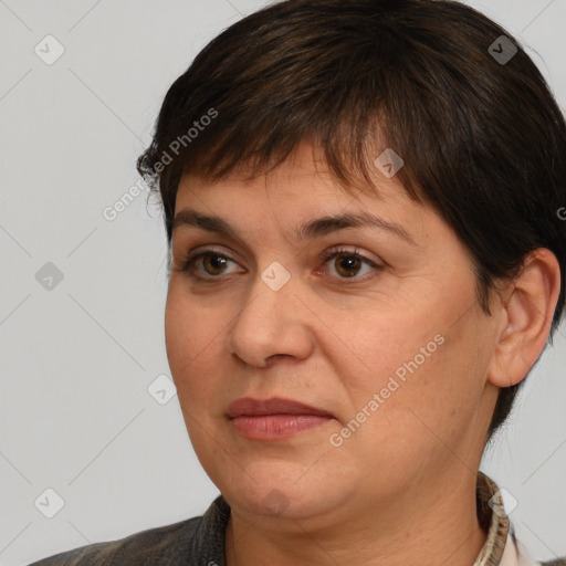 Joyful white adult female with medium  brown hair and brown eyes