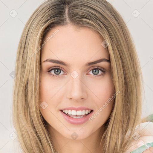 Joyful white young-adult female with long  brown hair and green eyes