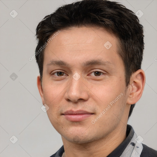 Joyful white young-adult male with short  brown hair and brown eyes