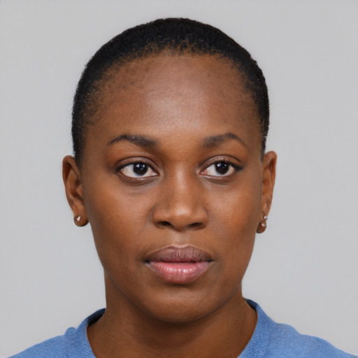 Neutral black young-adult female with short  brown hair and brown eyes