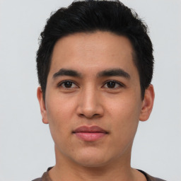 Neutral asian young-adult male with short  black hair and brown eyes