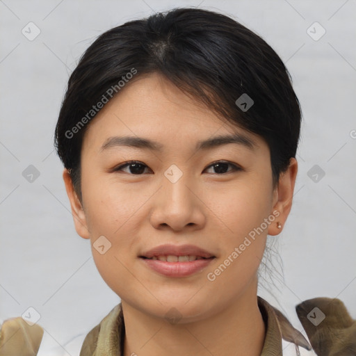 Joyful asian young-adult female with medium  brown hair and brown eyes