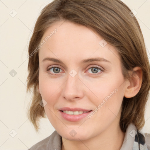 Joyful white young-adult female with medium  brown hair and grey eyes