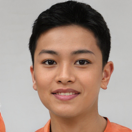 Joyful asian young-adult female with short  black hair and brown eyes