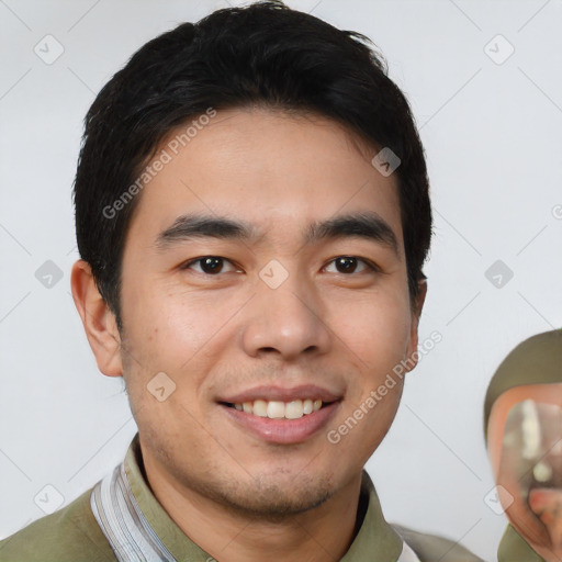 Joyful white young-adult male with short  black hair and brown eyes