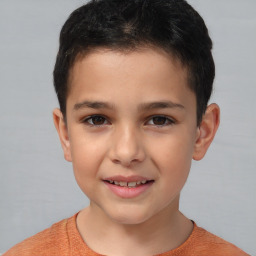 Joyful white child male with short  brown hair and brown eyes