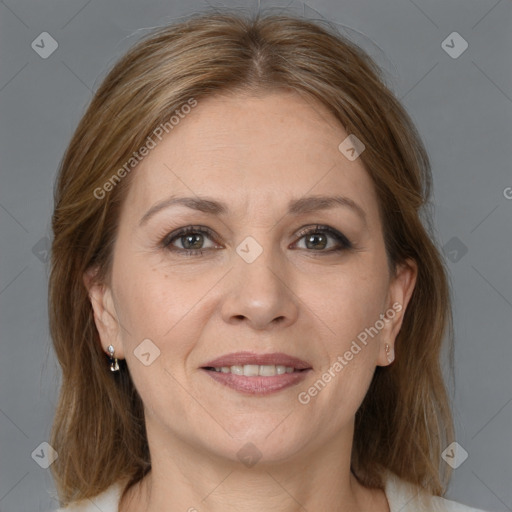 Joyful white adult female with medium  brown hair and grey eyes