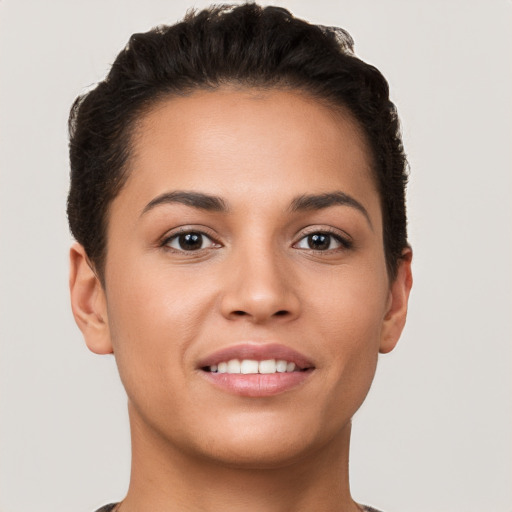 Joyful white young-adult female with short  brown hair and brown eyes