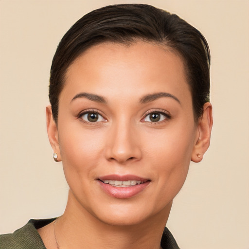 Joyful white young-adult female with short  brown hair and brown eyes