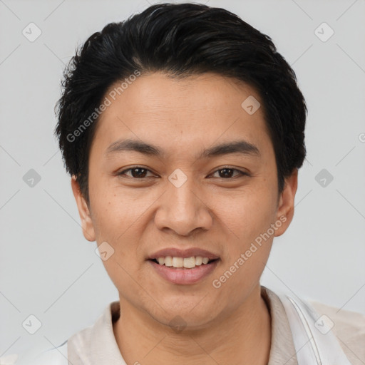 Joyful asian young-adult female with short  black hair and brown eyes