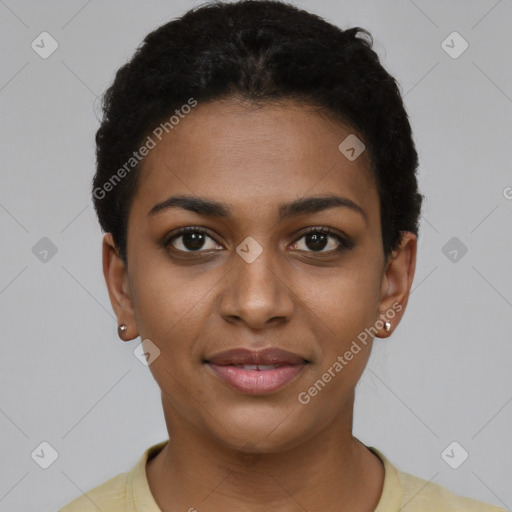 Joyful black young-adult female with short  brown hair and brown eyes