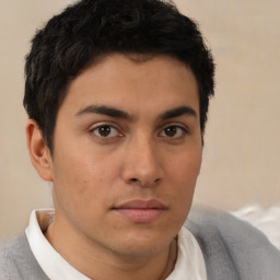 Neutral latino young-adult male with short  brown hair and brown eyes