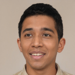 Joyful latino young-adult male with short  black hair and brown eyes