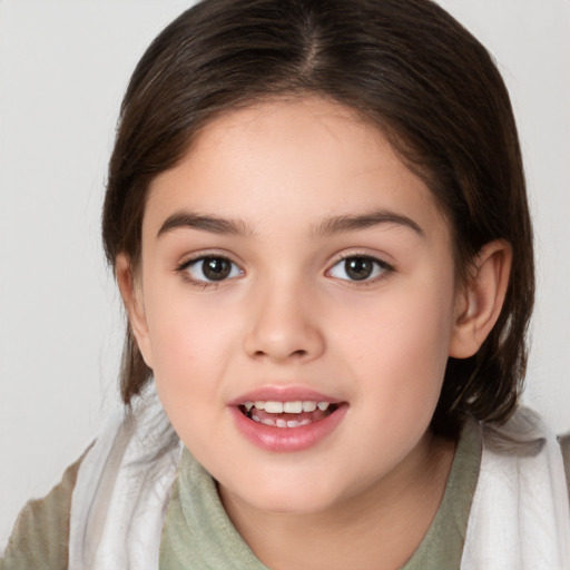 Joyful white child female with medium  brown hair and brown eyes