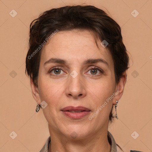 Joyful white adult female with short  brown hair and brown eyes