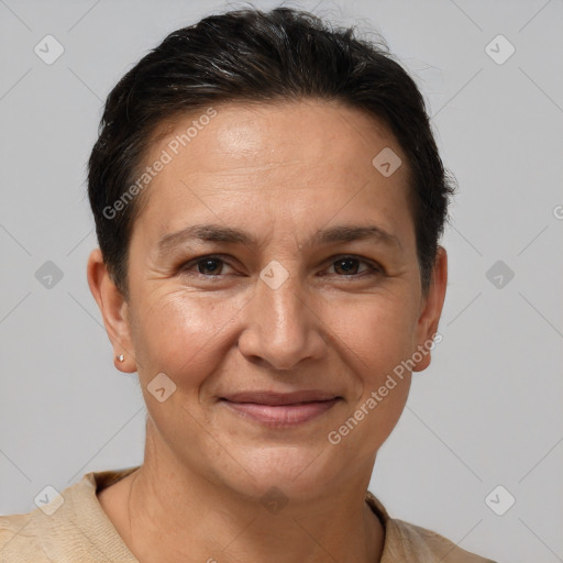 Joyful white adult female with short  brown hair and brown eyes