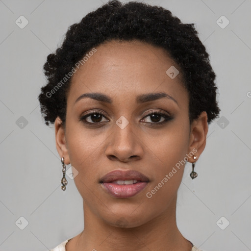 Joyful black young-adult female with short  black hair and brown eyes