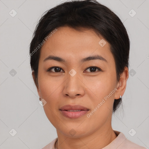 Joyful asian young-adult female with short  brown hair and brown eyes