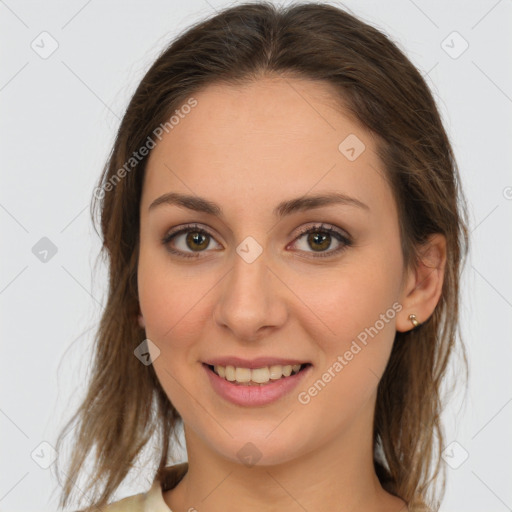 Joyful white young-adult female with long  brown hair and grey eyes