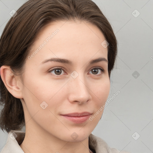 Neutral white young-adult female with medium  brown hair and brown eyes