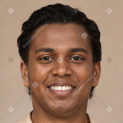 Joyful latino young-adult male with short  brown hair and brown eyes