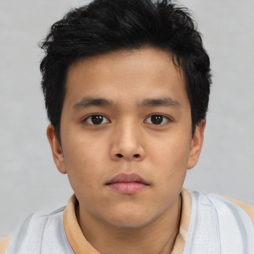 Neutral asian child male with short  brown hair and brown eyes