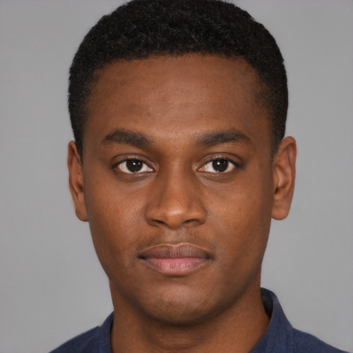 Neutral black young-adult male with short  brown hair and brown eyes