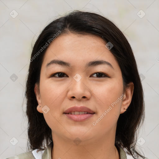 Joyful asian young-adult female with medium  brown hair and brown eyes