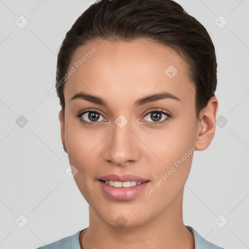 Joyful white young-adult female with short  brown hair and brown eyes