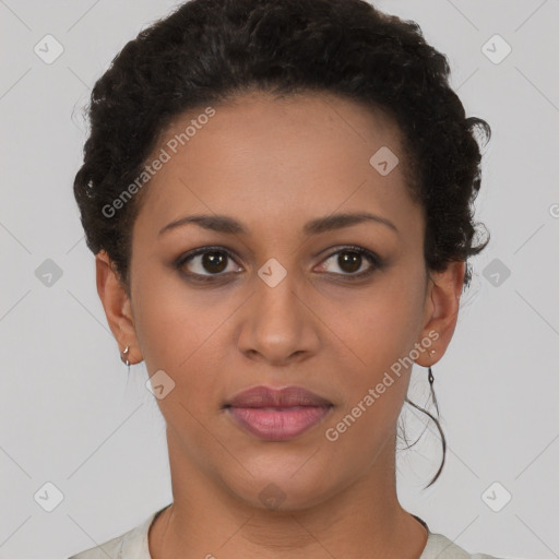 Joyful latino young-adult female with short  brown hair and brown eyes