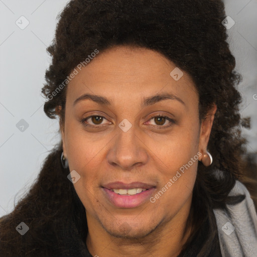 Joyful white adult female with long  brown hair and brown eyes