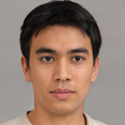 Neutral asian young-adult male with short  brown hair and brown eyes