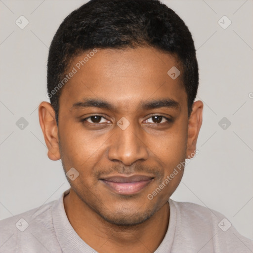 Joyful black young-adult male with short  black hair and brown eyes