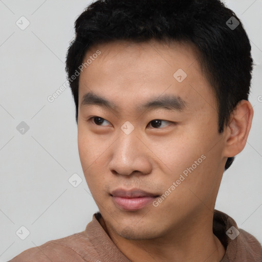 Neutral asian young-adult male with short  black hair and brown eyes