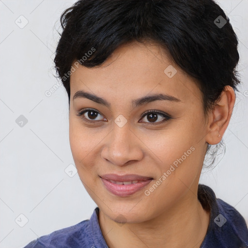 Joyful asian young-adult female with medium  black hair and brown eyes